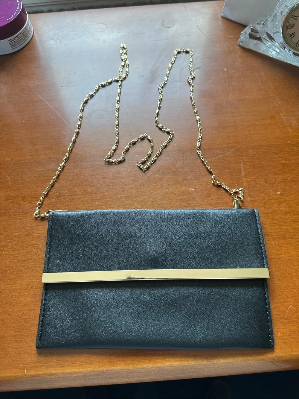 Black Chain-Strap Crossbody Clutch with Gold Accent
